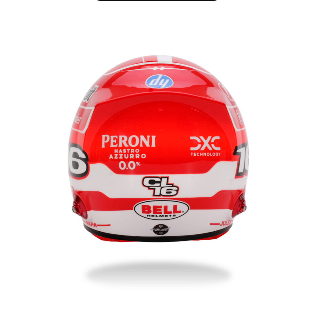 Red and white racing helmet with visible branding on a white background
