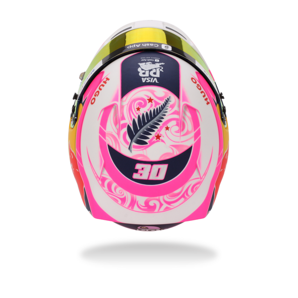 Pink helmet with branding on a white background