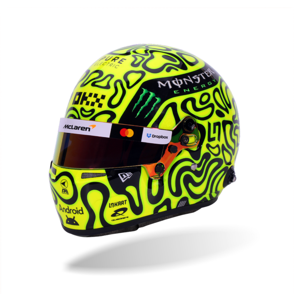 Norris racing helmet with visible branding on a white background