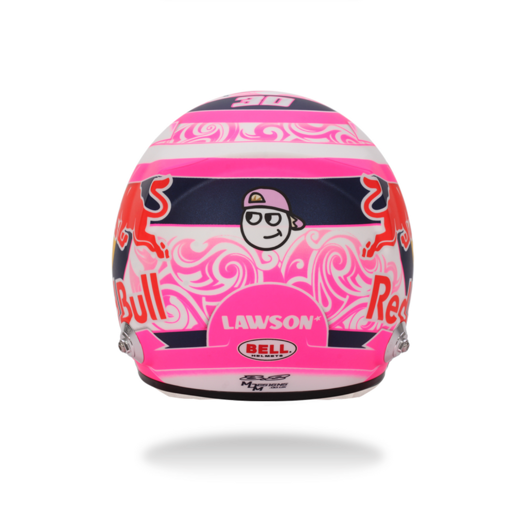 Pink and blue racing helmet with various logos on a white background